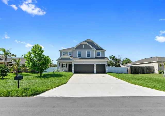 Photo 2 of Single family home for sale at 412 Sw Dailey Ave, Port St Lucie, FL 34953 | MLS# B26069684 | Listing updated on 2026-09-14