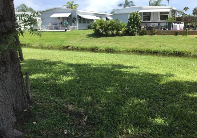 Photo 3 of Manufactured home for sale at 114 Camino Del Rio, Port St Lucie, FL 34952 | MLS# B26070080 | Listing updated on 2026-09-15