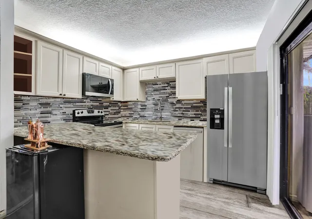 Photo 1 of Townhouse for sale at 9993 Nw 7th Street, Plantation, FL 33324 | MLS# B26070517 | Listing updated on 2026-09-15
