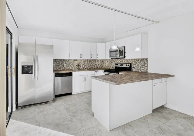 Photo 1 of Condo for sale at 3003 San Clara Dr #3-C, Delray Beach, FL 33445 | MLS# B26071801 | Listing updated on 2026-09-16