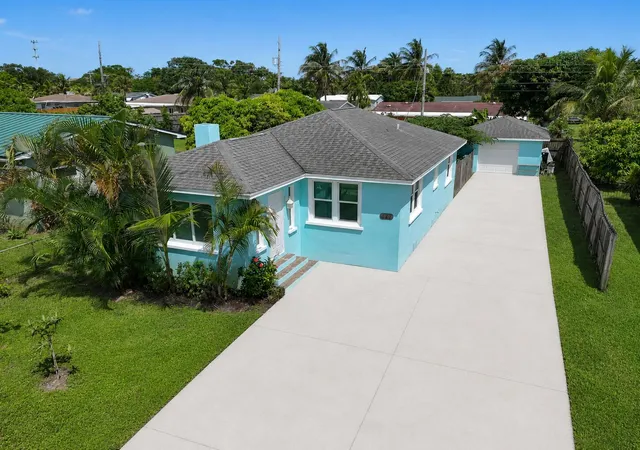 Single family home for sale at 411 Evergreen Dr, West Palm Beach, FL 33403 | MLS# B26071800