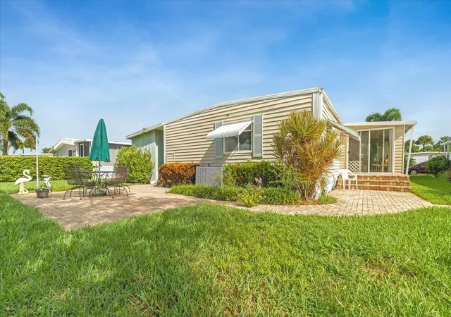 Photo 3 of Manufactured home for sale at 132 Nw 53rd Place, Deerfield Beach, FL 33064 | MLS# B26072075 | Listing updated on 2026-09-23