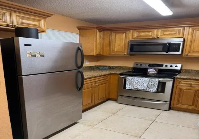 Listing Photo 4 - Condo for sale in building located at 1480 Windorah Wy, West Palm Beach, FL 33411 - Unit #B