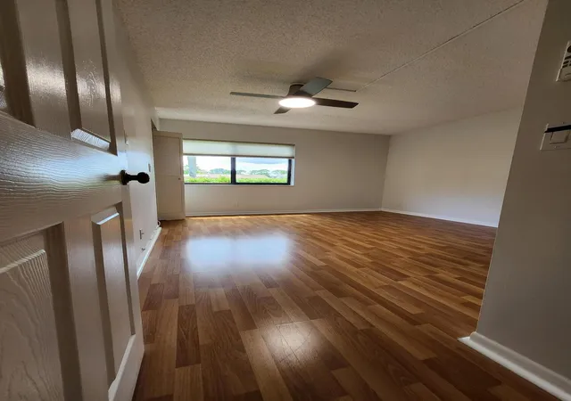 Photo 2 of Condo for sale at 311 Knotty Pine Cir #A-1, Greenacres, FL 33463 | MLS# B26072397 | Listing updated on 2026-09-14