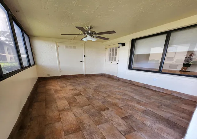 Photo 3 of Condo for sale at 311 Knotty Pine Cir #A-1, Greenacres, FL 33463 | MLS# B26072397 | Listing updated on 2026-09-14