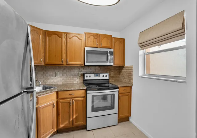 Photo 2 of Condo for sale at 8400 Lagos De Campo Blvd #305, Tamarac, FL 33321 | MLS# B26072468 | Listing updated on 2026-09-23