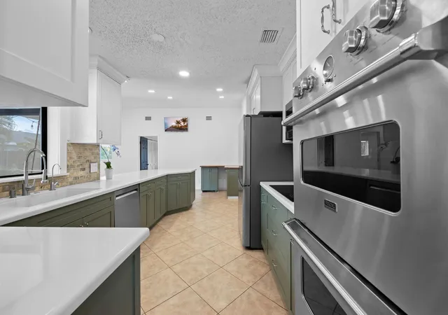 Photo 1 of Single family home for sale at 9965 NW 23rd Street, Coral Springs, FL 33065 | MLS# B26072686 | Listing updated on 2026-09-15