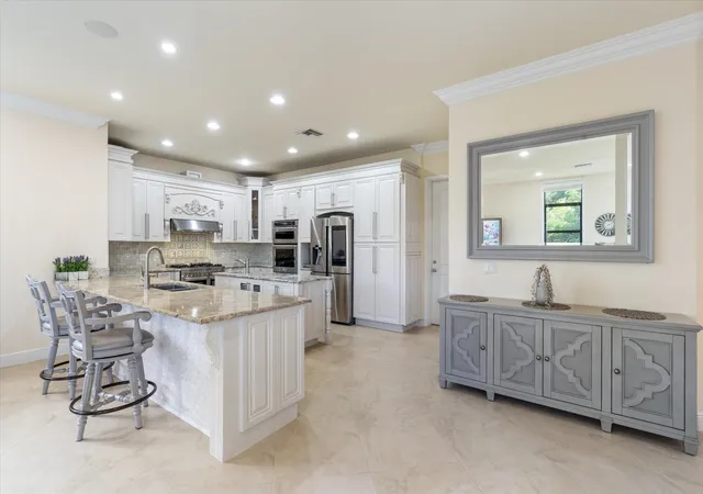 Photo 2 of Single family home for sale at 301 Sandalwood Ln, Boca Raton, FL 33487 | MLS# B26073190 | Listing updated on 2026-09-14