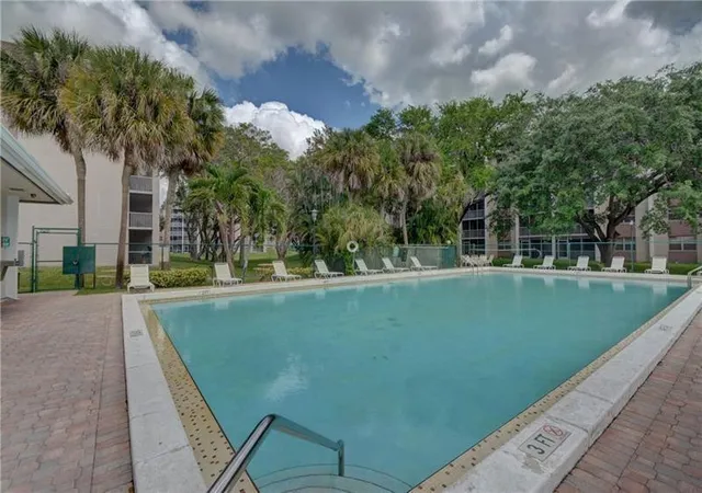 Photo 2 of Condo for sale at 8735 Ramblewood Dr #212, Coral Springs, FL 33071 | MLS# B26073969 | Listing updated on 2026-09-16