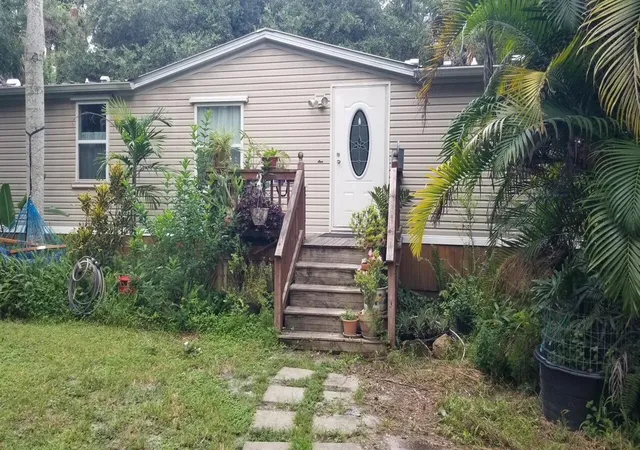 Single family home for sale at 6964 E Center St, Okeechobee, FL 34974 | MLS# B26074394