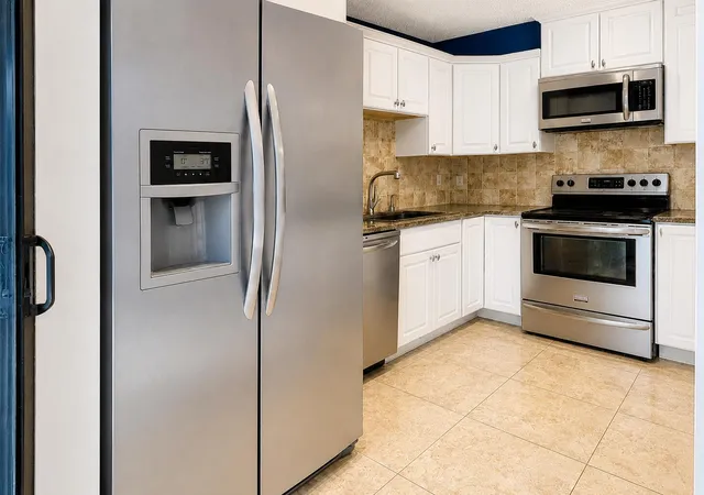 Photo 3 of Townhouse for sale at 1535 Masters Cir #148, Delray Beach, FL 33445 | MLS# B26074430 | Listing updated on 2026-09-15