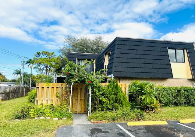 Photo 1 of Townhouse for sale at 295 Woodland Rd, Palm Springs, FL 33461 | MLS# B26074645 | Listing updated on 2026-10-03