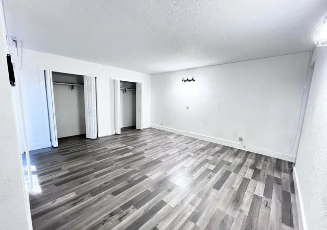 Photo 3 of Townhouse for sale at 295 Woodland Rd, Palm Springs, FL 33461 | MLS# B26074645 | Listing updated on 2026-10-03