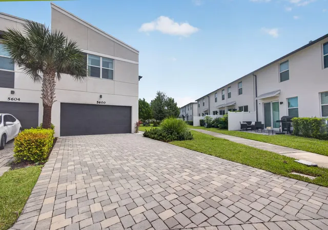 Photo 1 of Townhouse for sale at 5600 Mentmore Dr, Mangonia Park, FL 33407 | MLS# B26075045 | Listing updated on 2026-09-23