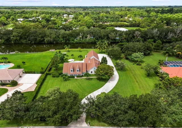 Photo 4 of Single family home for sale at 5703 Lago Del Sol Dr, Lake Worth, FL 33449 | MLS# B26075409 | Listing updated on 2026-09-14
