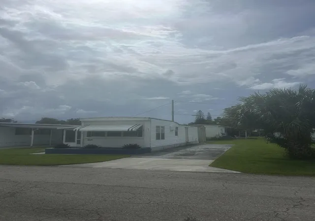 Photo 2 of Manufactured home for sale at 5400 Se Jack Ave #K3, Stuart, FL 34997 | MLS# B26075656 | Listing updated on 2026-09-14