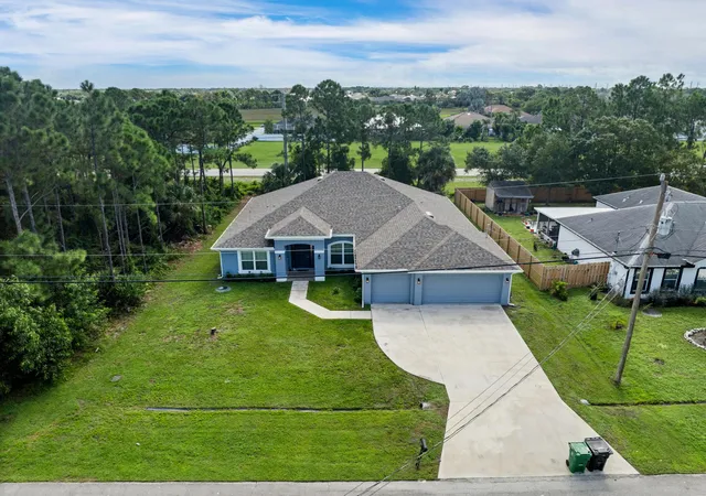 Photo 3 of Single family home for sale at 5863 NW Carovel Ave, Port Saint Lucie, FL 34986 | MLS# B26075716 | Listing updated on 2026-09-14