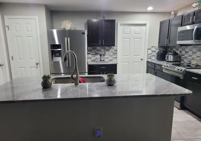 Photo 4 of Single family home for sale at 1413 NE 9th Avenue, Cape Coral, FL 33909 | MLS# B26076433 | Listing updated on 2026-09-15
