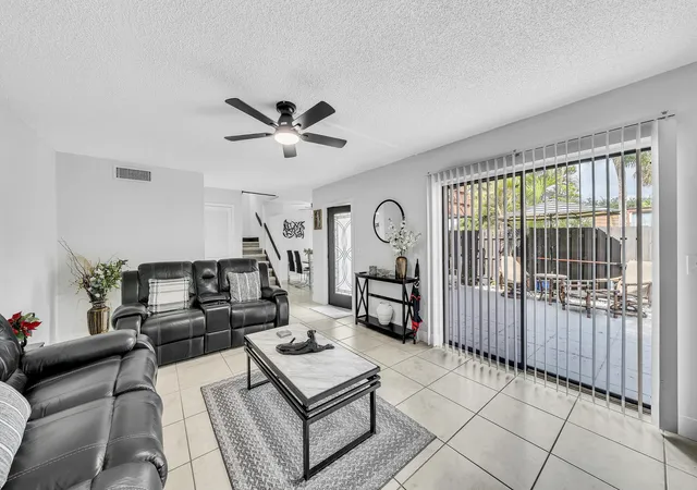 Photo 2 of Townhouse for sale at 2228 White Pine Cir #A, Greenacres, FL 33415 | MLS# B26076633 | Listing updated on 2026-10-07