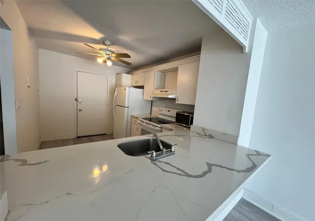Photo 3 of Condo for sale at 6855 Abbott Ave #201, Miami Beach, FL 33141 | MLS# B26076939 | Listing updated on 2026-10-07
