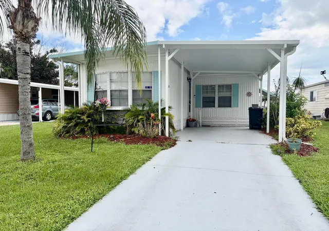 Photo 1 of Manufactured home for sale at 10 La Paloma Ln, Port Saint Lucie, FL 34952 | MLS# B26076975 | Listing updated on 2026-10-03