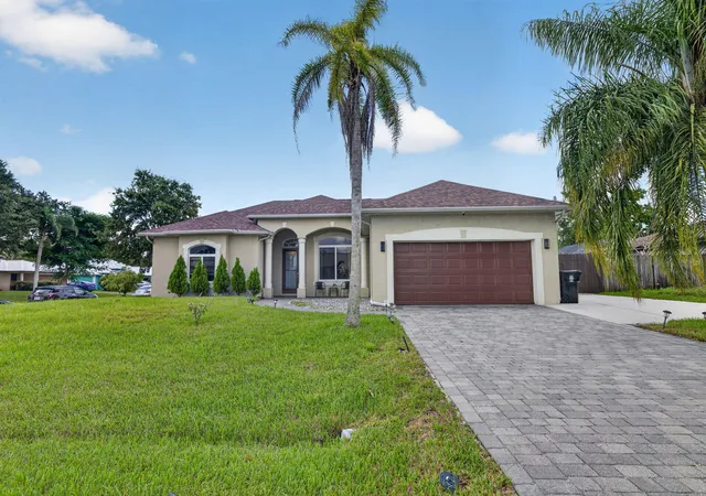 Photo 1 of Single family home for sale at 1402 Sw Abingdon Ave, Port Saint Lucie, FL 34953 | MLS# B26076983 | Listing updated on 2026-09-16
