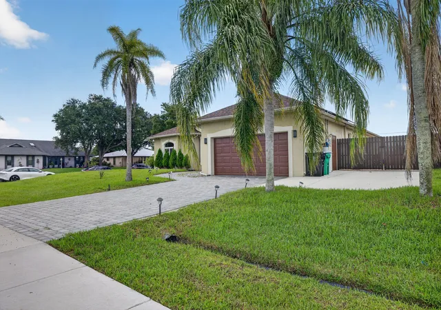 Photo 3 of Single family home for sale at 1402 Sw Abingdon Ave, Port Saint Lucie, FL 34953 | MLS# B26076983 | Listing updated on 2026-09-16