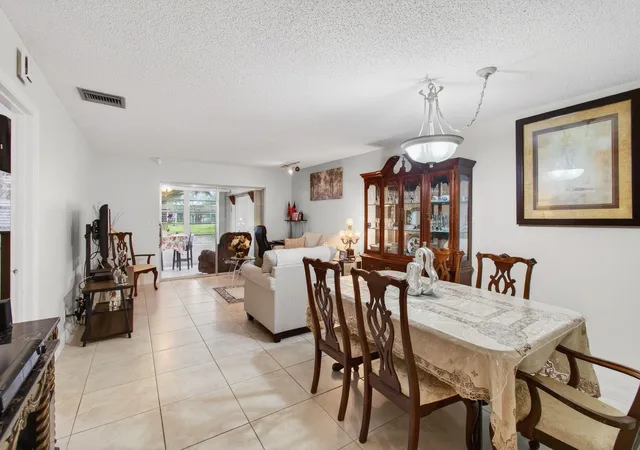 Photo 3 of House for sale at 136 Lake Rebecca Dr, West Palm Beach, FL 33411 | MLS# B26077048 | Listing updated on 2026-09-16