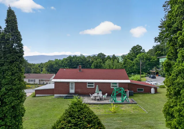 Photo 3 of Single family home for sale at 48 Mansion Hl Dr, Lincoln, NH 03251 | MLS# 5102042 | Listing updated on 2026-10-09