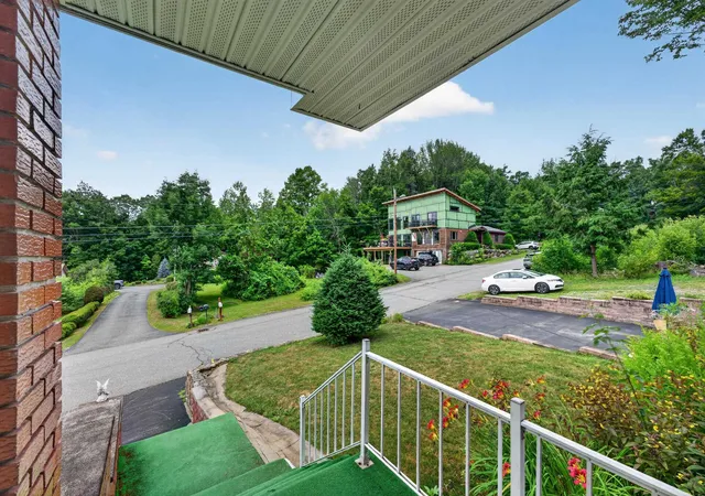 Photo 4 of Single family home for sale at 48 Mansion Hl Dr, Lincoln, NH 03251 | MLS# 5102042 | Listing updated on 2026-10-09