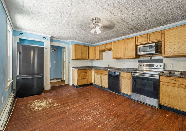 Photo 4 of Single family home for sale at 1 Summer St, Farmington, NH 03835 | MLS# 5107959 | Listing updated on 2026-09-08