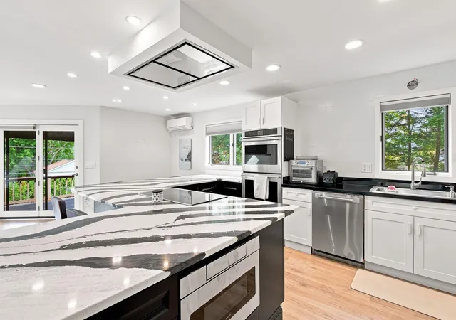 Photo 3 of Townhouse for sale at 21 Woodbury Dr #31, Bristol, NH 03222 | MLS# 5107983 | Listing updated on 2026-09-09