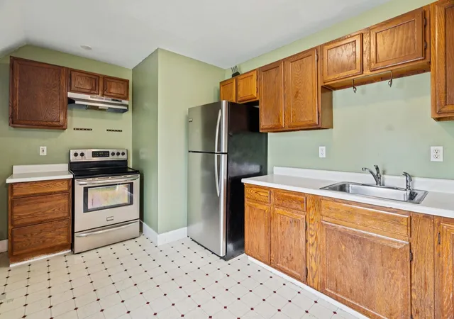 Photo 3 of Multi family home for sale at 463 Lake Ave, Manchester, NH 03103 | MLS# 5108239 | Listing updated on 2026-09-08