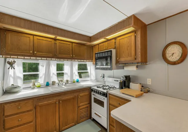 Photo 4 of Manufactured home for sale at 11 Paugus Cir, Rochester, NH 03867 | MLS# 5108363 | Listing updated on 2026-09-09