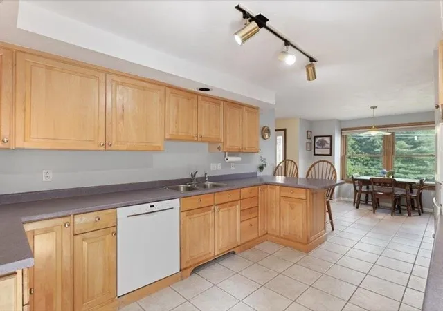 Photo 3 of Sale Pending at 110 Pheasant Ln, Manchester, NH 03109 | MLS# 5108678 | Listing updated on 2026-09-21