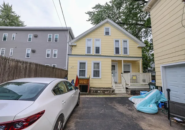 Photo 3 of Multi family home for sale at 145-147 Pearl St, Manchester, NH 03104 | MLS# 5109582 | Listing updated on 2026-10-20