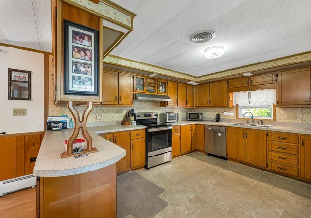 Photo 2 of Manufactured home for sale at 21 Sir Lancelot Dr, Exeter, NH 03833 | MLS# 5109996 | Listing updated on 2026-09-24