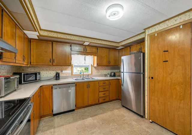 Photo 3 of Manufactured home for sale at 21 Sir Lancelot Dr, Exeter, NH 03833 | MLS# 5109996 | Listing updated on 2026-09-24
