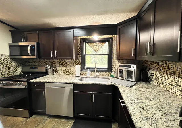 Photo 3 of Manufactured home for sale at 156 N River Rd, Epping, NH 03042 | MLS# 5112565 | Listing updated on 2026-10-05