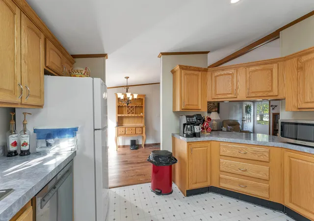 Photo 3 of Manufactured home for sale at 59 Oak Dr, North Hampton, NH 03862 | MLS# 5113616 | Listing updated on 2026-10-13