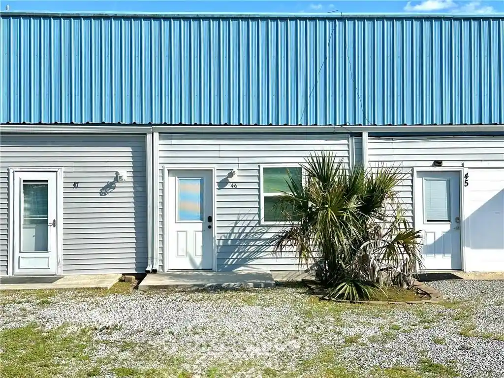 Listing Photo 1 - Condo for sale in 32875 Rivergate Cir located at 32875 Rivergate Cir, Springfield, LA 70462 - Unit #46