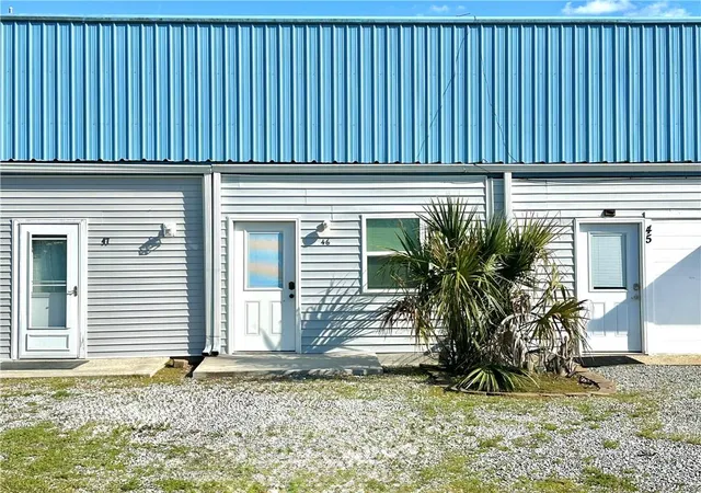 Listing Photo 1 - Condo for sale in building located at 32875 Rivergate Cir, Springfield, LA 70462 - Unit #46
