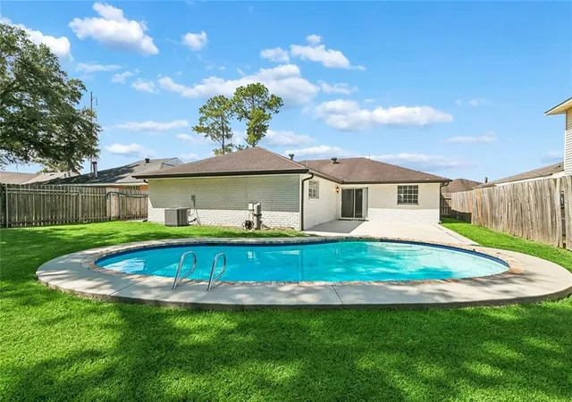 Single family home for sale at 7731 Pebble Dr, New Orleans, LA 70128 | MLS# 2572975