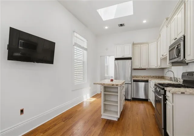 Listing Photo 3 - Condo for sale in building located at 7911 Cohn St, New Orleans, LA 70118 - Unit #7911