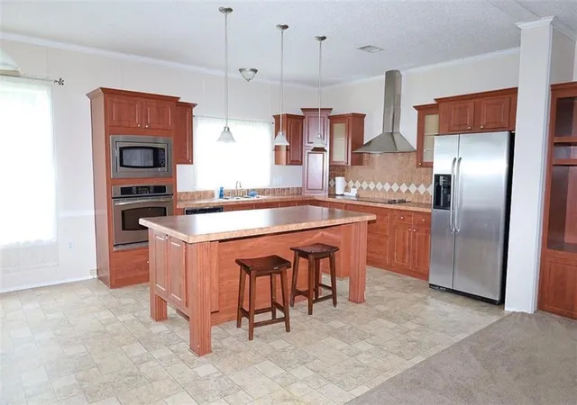 Photo 2 of Single family home for sale at 102 S Dennis St, Thibodaux, LA 70301 | MLS# 2575059 | Listing updated on 2026-09-08