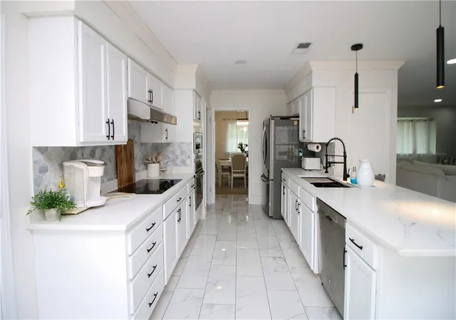Photo 4 of Single family home for sale at 502 Burgander Dr, Kenner, LA 70065 | MLS# 2577100 | Listing updated on 2026-09-15