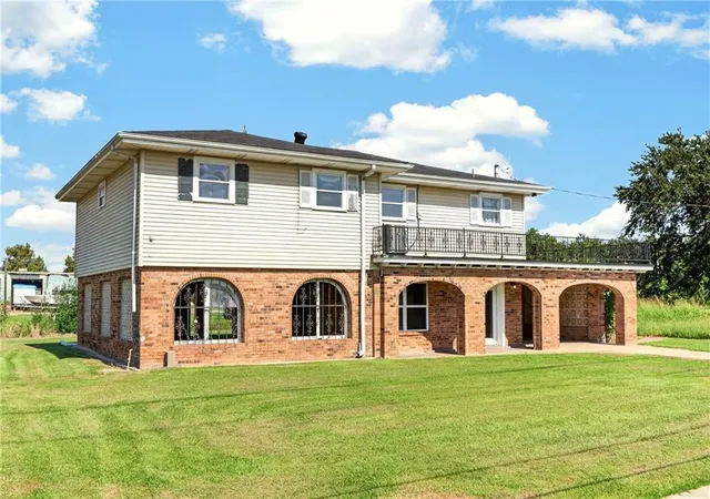 Photo 2 of Single family home for sale at 214 Orangewood Dr, Buras, LA 70041 | MLS# 2577631 | Listing updated on 2026-09-19