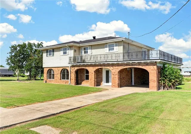 Photo 3 of Single family home for sale at 214 Orangewood Dr, Buras, LA 70041 | MLS# 2577631 | Listing updated on 2026-09-19