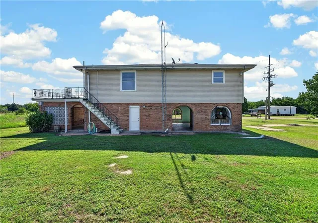 Photo 3 of Single family home for sale at 214 Orangewood Dr, Buras, LA 70041 | MLS# 2577631 | Listing updated on 2026-09-19