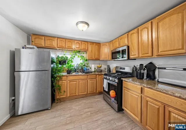 Photo 3 of Multi family home for sale at 416 Frankfort St, Orange, NJ 07050 | MLS# 26014098 | Listing updated on 2026-09-01